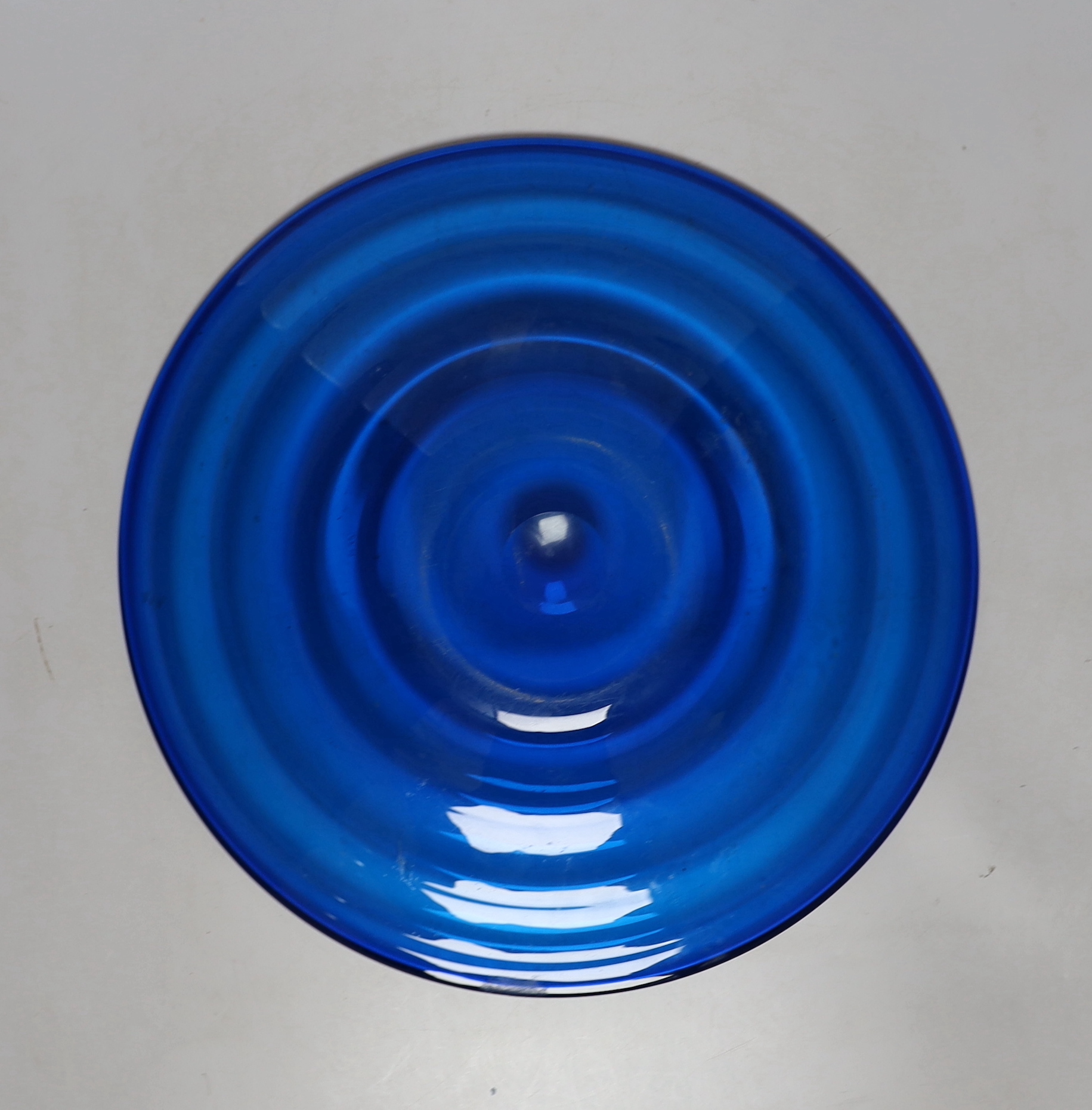 Four pieces of Mdina glass, three signed together with a blue glass dish, largest Mdina vase 19.5cm high
